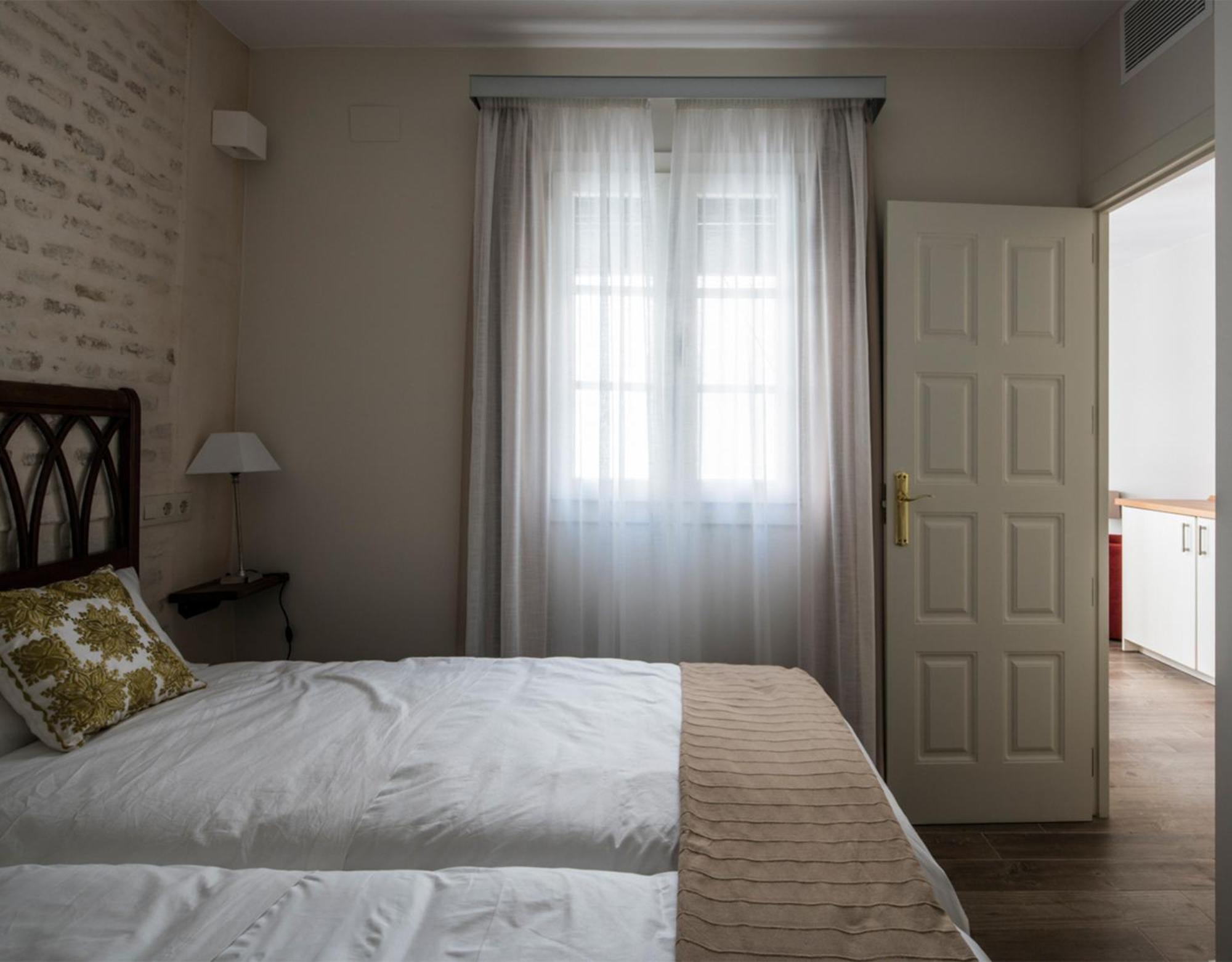 Santa Maria Apartments Севиля Стая снимка